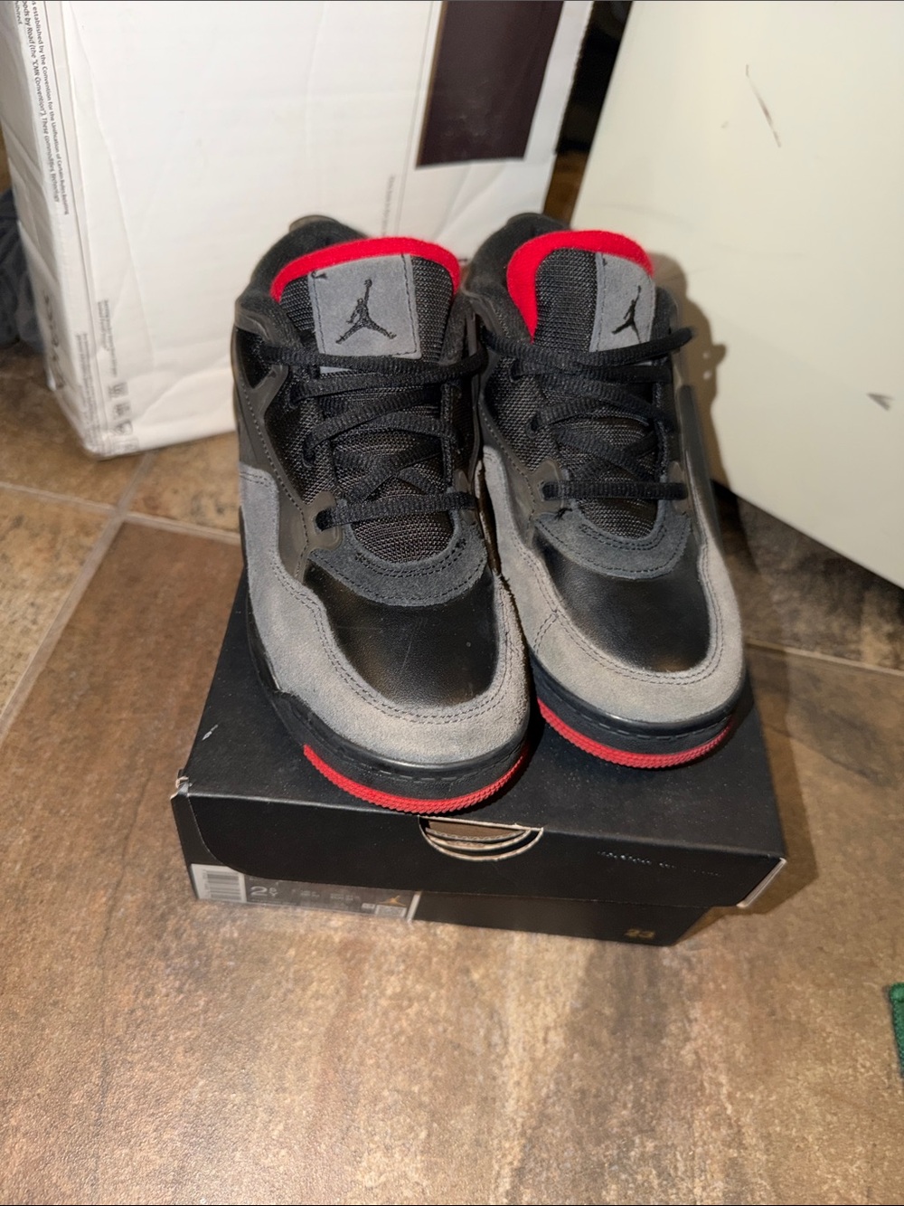 Jordan 4 RM(PS) Boys Black/Varsity and Red Low-Top Sneakers